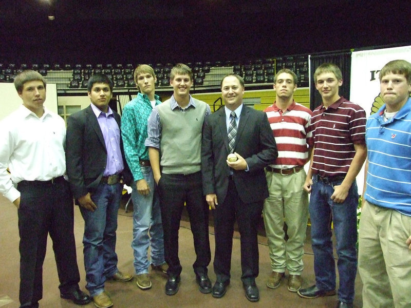 Image: Coach Josh Ward received a team ball from the seniors.