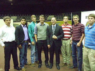Image: Coach Josh Ward received a team ball from the seniors.
