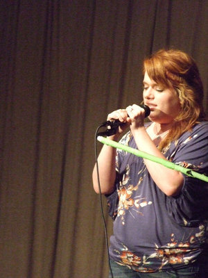 Image: Emily Stiles sings “Angel By My Side”.