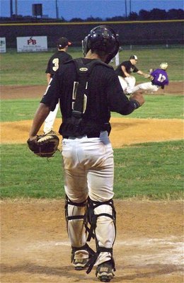 Image: Italy’s catcher Reid Jacinto(5) connects with second baseman John Byers(18) to tag out a sliding Indian preserving a 10-0 shutout victory in game 2 against Alvarado. 