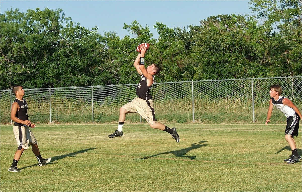 Image: Italy senior, Hayden Woods(50), secures an interception in the endzone against the Dawson Bulldogs.