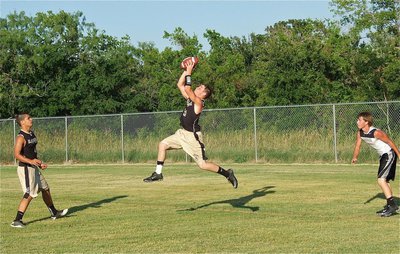 Image: Italy senior, Hayden Woods(50), secures an interception in the endzone against the Dawson Bulldogs.