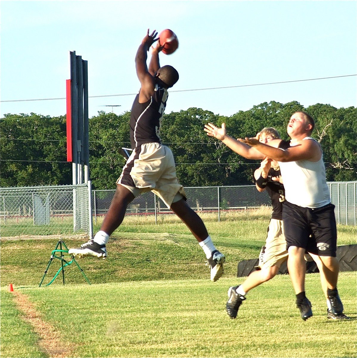 Image: Marvin Cox(3) deflects a pass into the endzone.