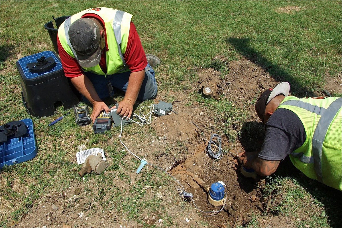 Image: Welcome to the digital age: RG3 Utility foreman, Charlie Bateman, and fellow crewman, Alfredo Bolado, Jr., install a Smart Meter. Replacing all the old drive-by meters within the City of Italy will take about 15 days according to Bateman.