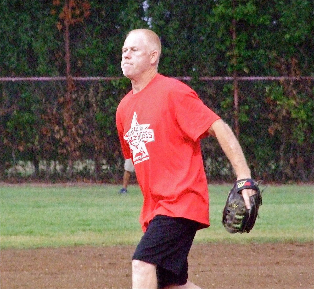 Image: Earl “Red” Buchanan starts on the mound for the Italy Fire Department.