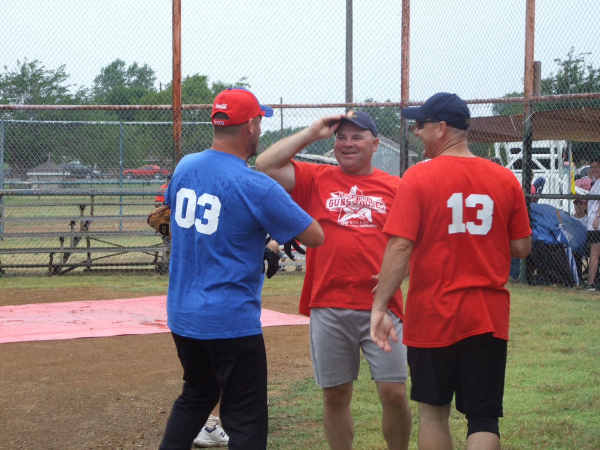 Image: A little fun on the ball field among friends.