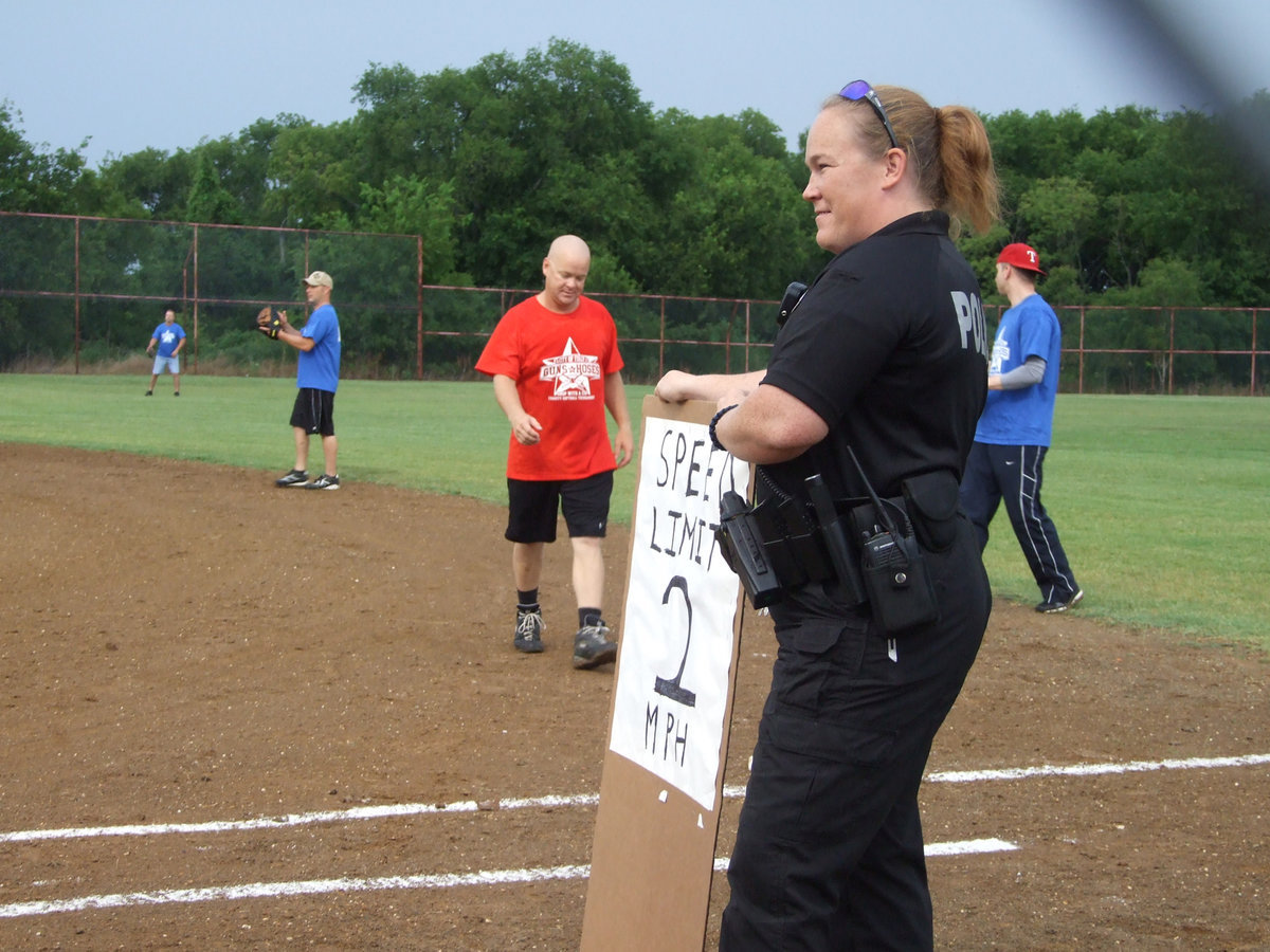 Image: Officer Jamie Thompson slows the runners to a snail’s pace.