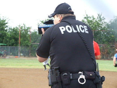 Image: Officer Eric Toliver backs up his fellow officers.