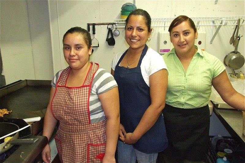 Image: Lead cook Lily, talented tortilla maker Tommy and part owner and kitchen supervisor Mireya add flavor to La Estrellita II’s menu. 