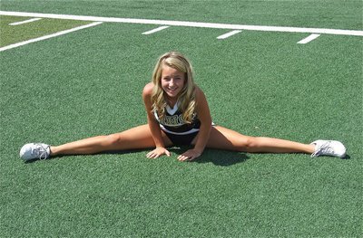 Image: Italy’s Britney Chambers works on possible cheer moves for the commercial.