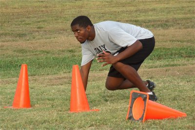 Image: The eyes tell it all: Gladiator Paul Harris is ready to lead Italy’s defensive attack.