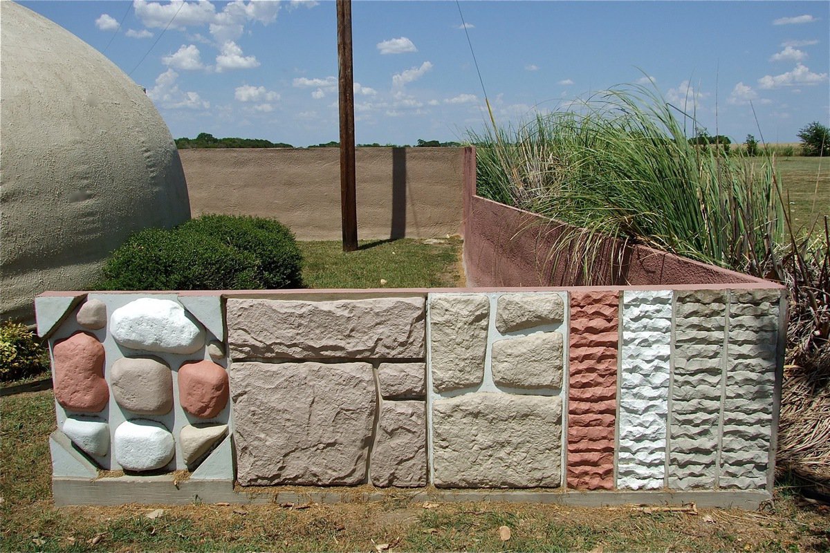 Image: Pre-stamped forms can help create patterns within the concrete fencing during the initial spraying.