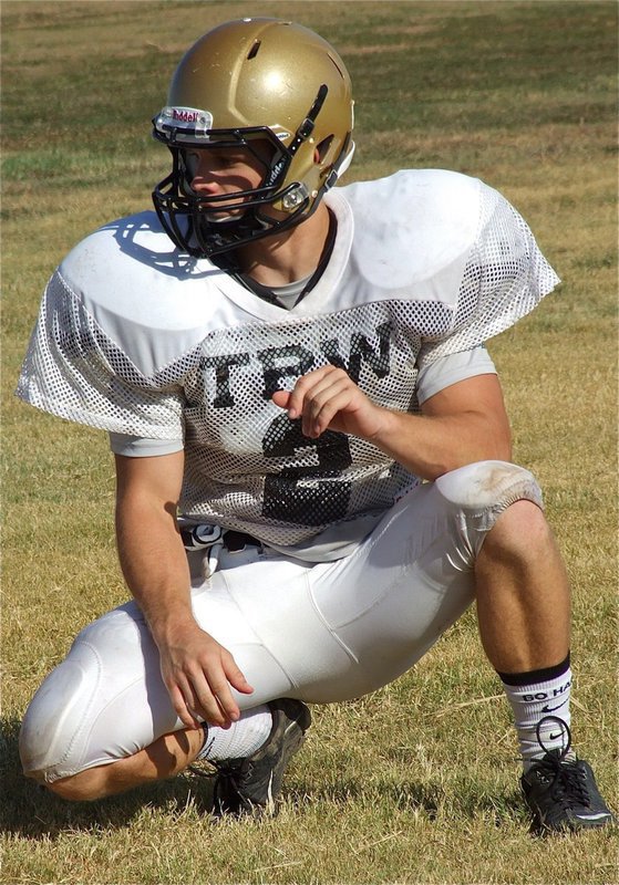 Image: Chase Hamilton(2) hopes the ball will be snapped very soon.