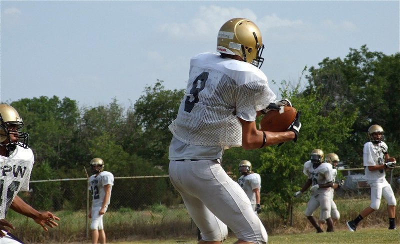 Image: Cole Hopkins(9) makes a sideline grab during Wednesdays workouts.