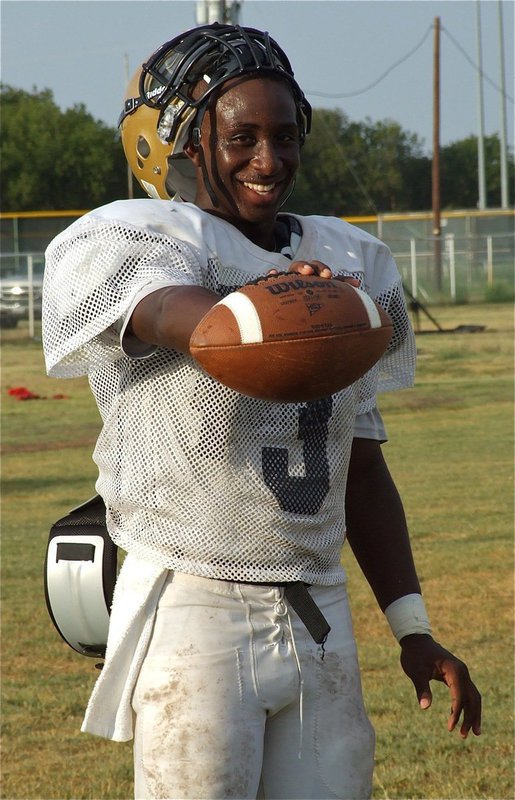 Image: Marvin Cox(3) is a weapon with a the ball in his hand.