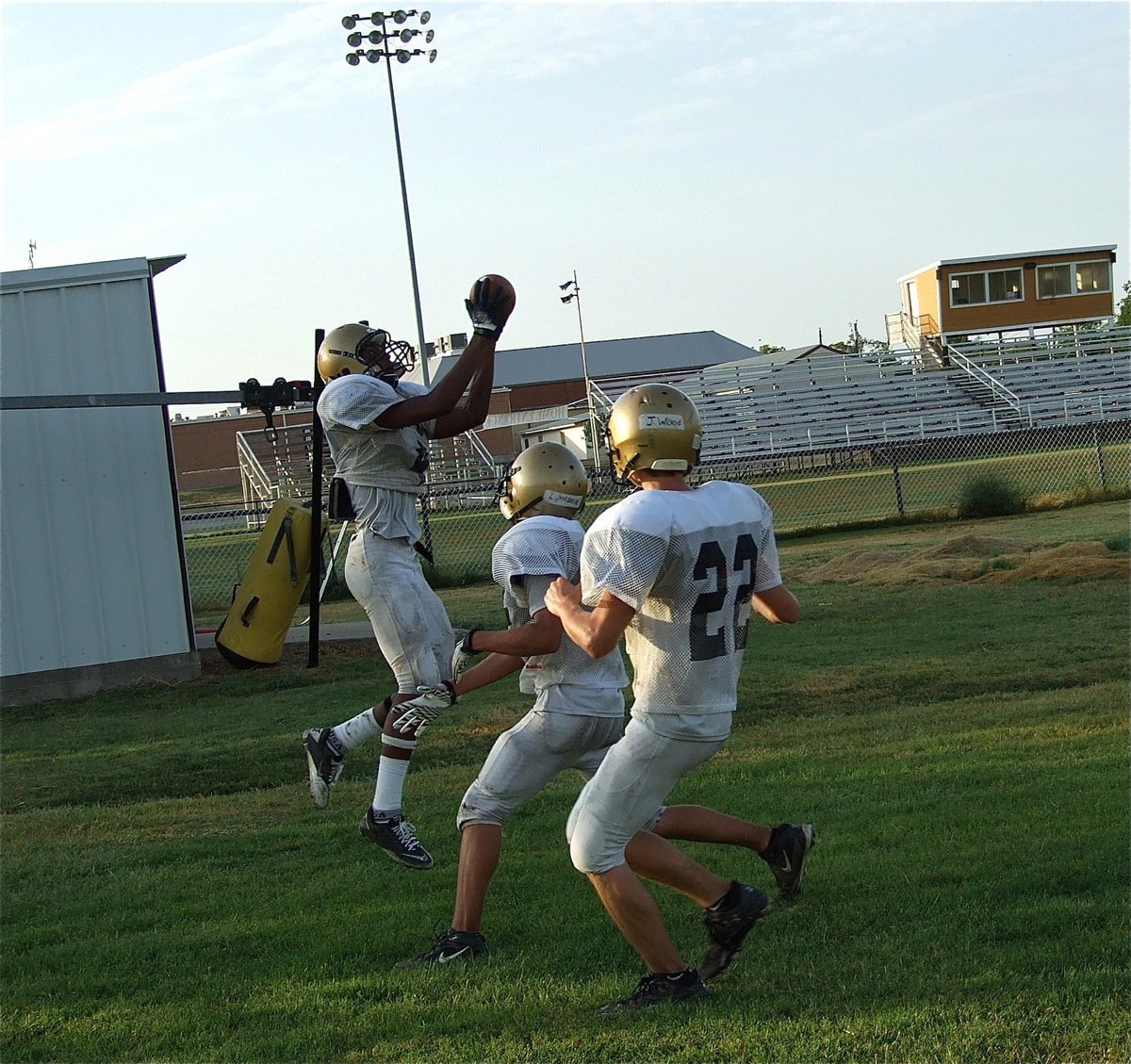Image: Trevon Robertson(4) makes a two-handed grab in the back corner of the endzone.