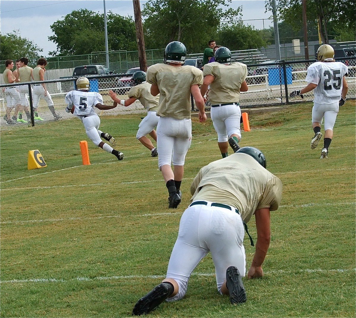 Image: Eric Carson(5) sneaks in for touchdown but the Eagles get lucky when a holding penalty brings it back.