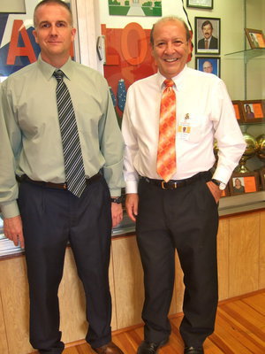 Image: Mr. Tennery (elementary principal) and Mr. DelBosque were the first smiling faces you saw as you entered the school on Thursday night for meet the teacher night.