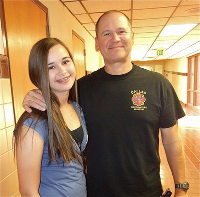Image: Amber Hooker is accompanied by her father Jerry Hooker during Meet the Teacher Night.