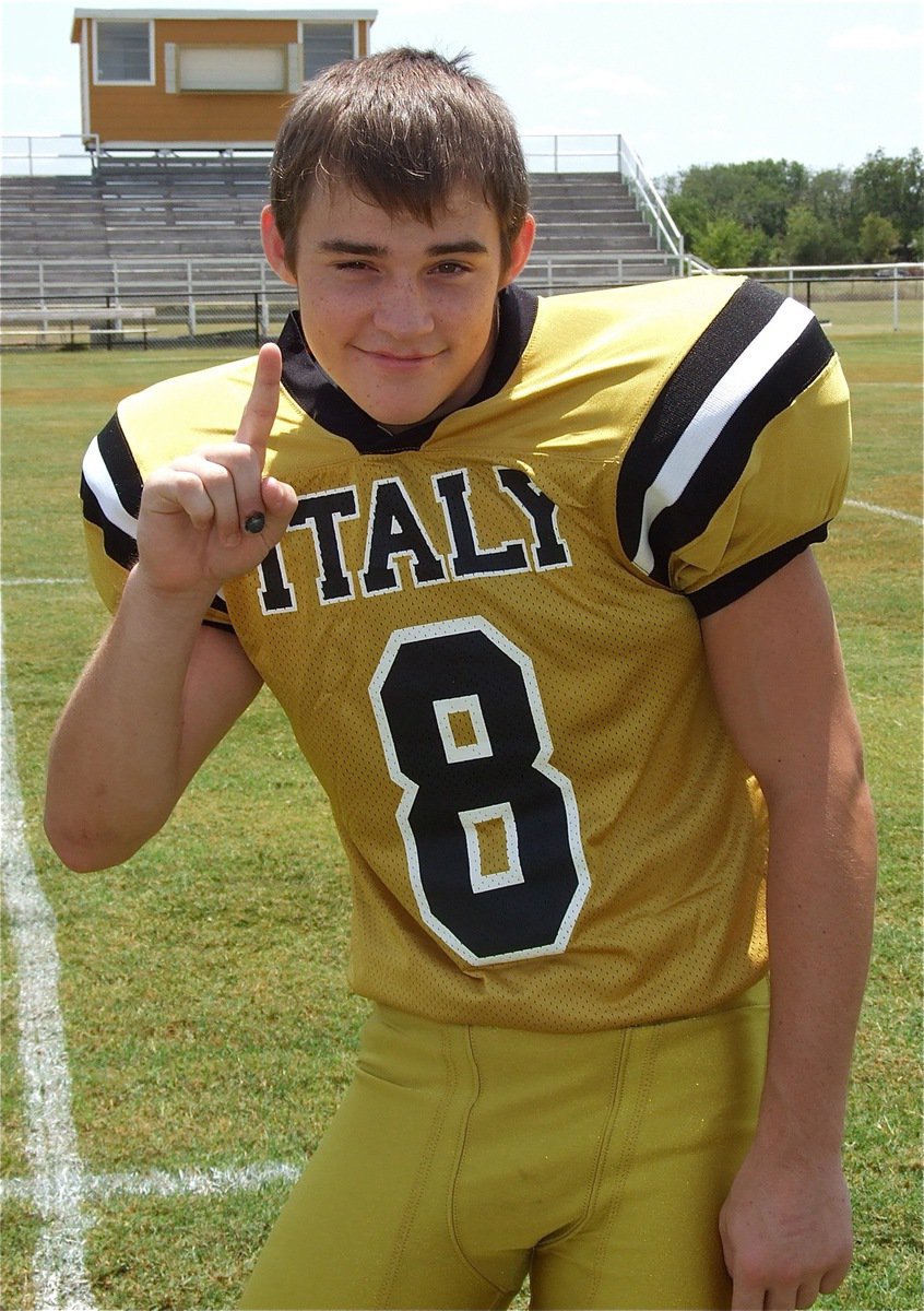 Image: Hayden Woods(8) is proud to be a Gladiator, sore finger and all.