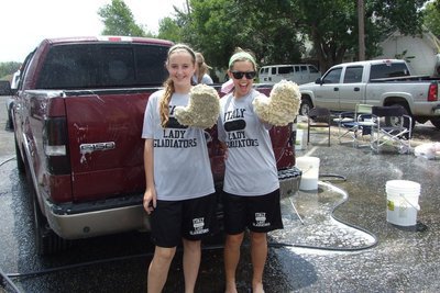 Image: Lady Gladiators Kelsey Nelson and Bailey Eubank are ready to clean cars.