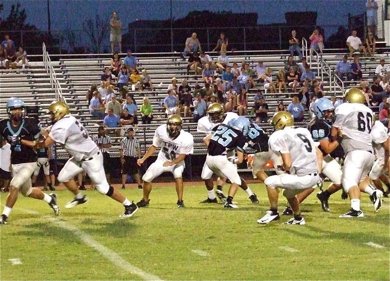 Image: Italy’s defensive tackle Zackery Boykin(50) sacks the Cougar quarterback and forces a fumble that could have been scooped by Chase Hamilton(9) and taken into the end zone if the play had not been blown dead as a precaution.