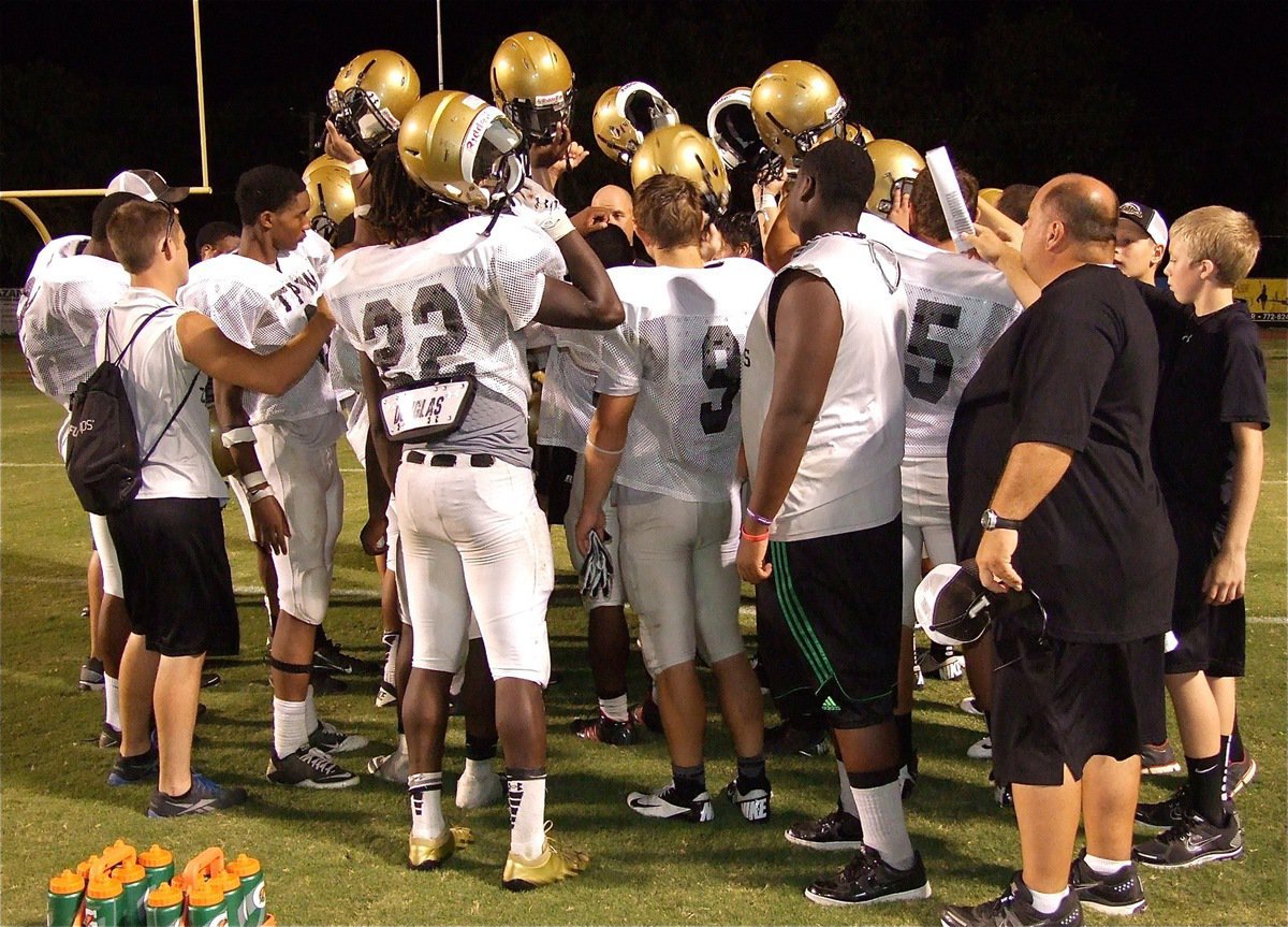 Image: Head Coach Hank Hollywood brings his Gladiator guys together after the scrimmage against Waco before heading back to Italy to prepare for their season opener against Maypearl.