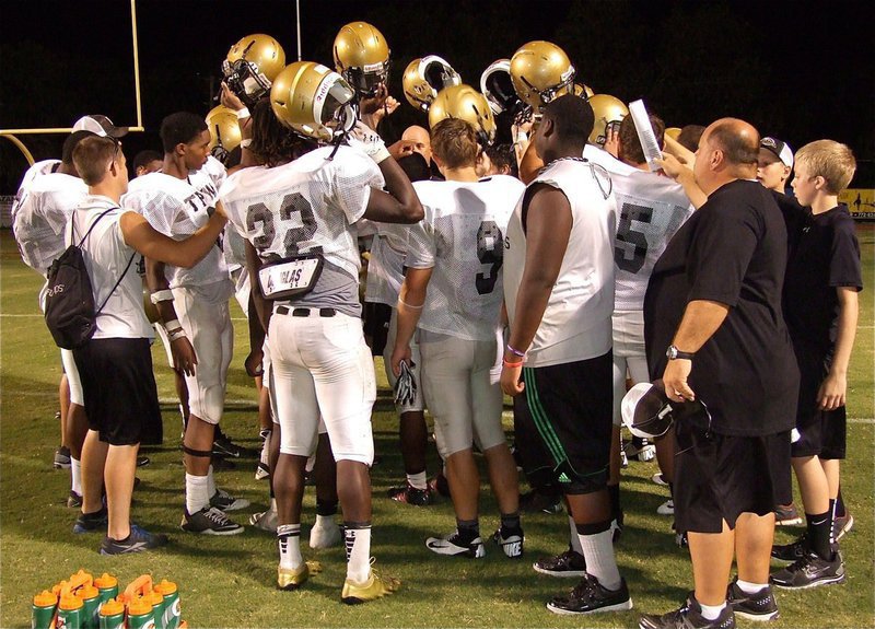 Image: Head Coach Hank Hollywood brings his Gladiator guys together after the scrimmage against Waco before heading back to Italy to prepare for their season opener against Maypearl.