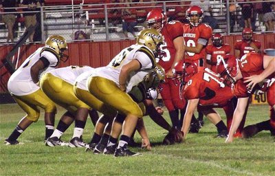 Image: Italy senior Zackery Boykin(55) and his fellow offensive lineman took care of business against Maypearl.