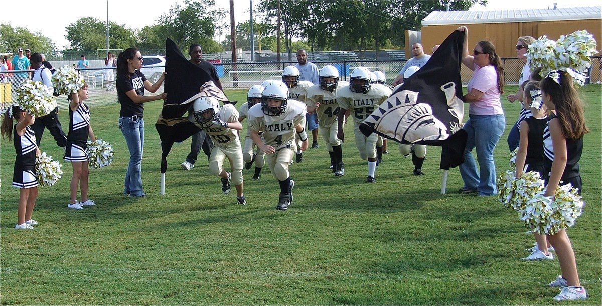 Image: Ty Cash(10) and Bryce DeBorde(4) lead the B-team Gladiators into battle against Mildred.