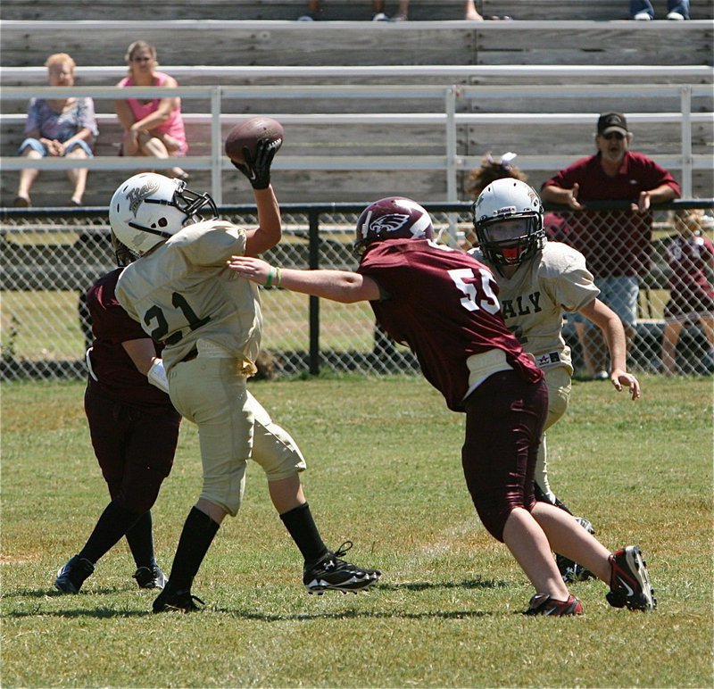 Image: A-Team’s Cade Brewer(21) tries to make something happen during a botched punt attempt.