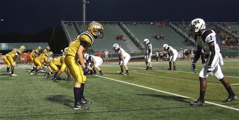 Image: Sophomore cornerback Cody Boyd(15) and his fellow Gladiator defenders try to keep Malakoff out of the end zone.