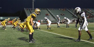 Image: Sophomore cornerback Cody Boyd(15) and his fellow Gladiator defenders try to keep Malakoff out of the end zone.