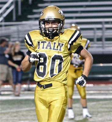 Image: Kelvin Joffre(80) trots out of the huddle to line up at wide receiver for the Gladiators.
