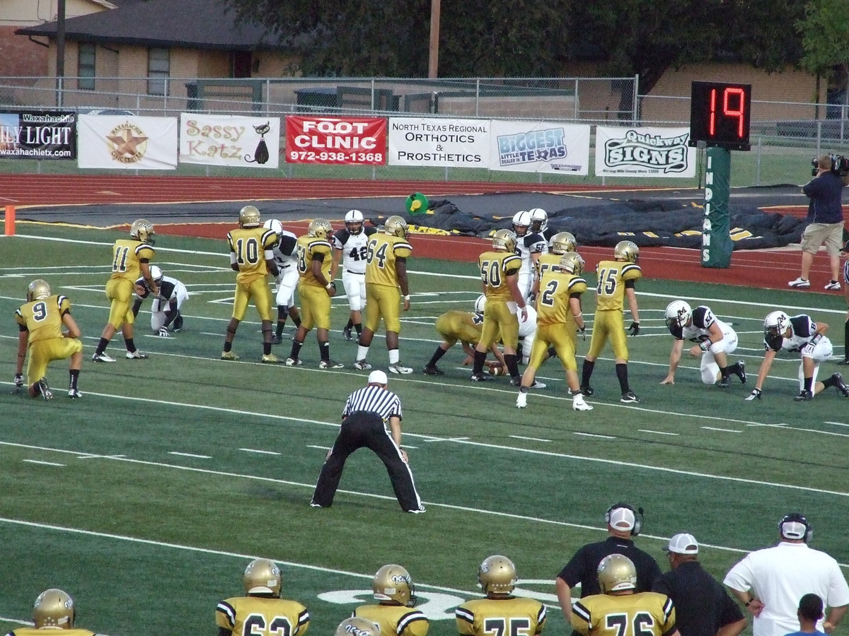 Image: Italy sets up for a point after attempt after taking a 6-0 lead against Malakoff. Chase Hamilton(2) was on the receiving end of an Eric Carson pass to score the first points in the history of the classic.