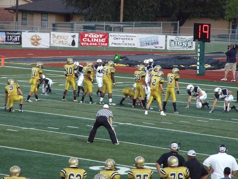 Image: Italy sets up for a point after attempt after taking a 6-0 lead against Malakoff. Chase Hamilton(2) was on the receiving end of an Eric Carson pass to score the first points in the history of the classic.