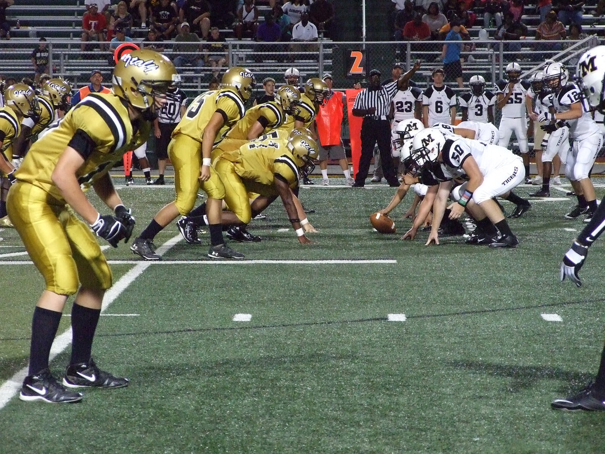 Image: Cornerback Cody Boyd(15) and the Gladiator defense try to tame the Tigers.