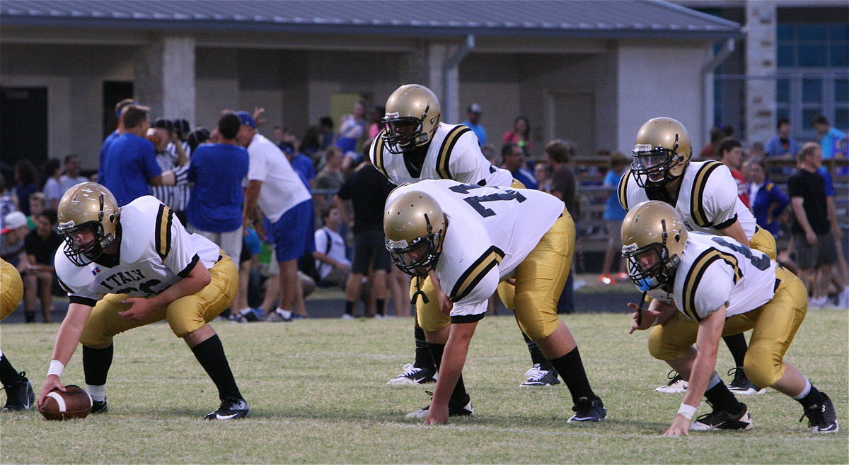 Image: The JV offensive is ready to roll against Sunnyvale with center Kyle Fortenberry(66), guard Colin Newman(71), tackle John Escamilla(63), tailback Billy Moore(32) and quarterback Ryan Connor(15) leading the way.