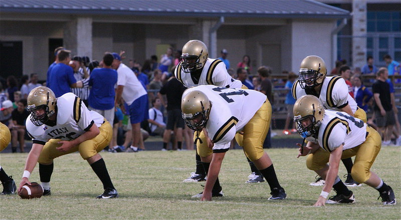 Image: The JV offensive is ready to roll against Sunnyvale with center Kyle Fortenberry(66), guard Colin Newman(71), tackle John Escamilla(63), tailback Billy Moore(32) and quarterback Ryan Connor(15) leading the way.