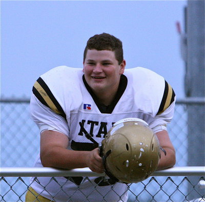Image: John Byers(75) relaxes before taking on Sunnyvale during the JV game at Raiders Stadium.
