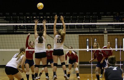 Image: Lady Gladiators Paige Westbrook(12) and Madison Washington(10) create a wall to stop Kopperl.