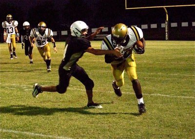Image: Tyvion Copeland(20) makes the catch, breaks a tackle and then goes 78-yards for an Italy touchdown in the fourth-quarter.