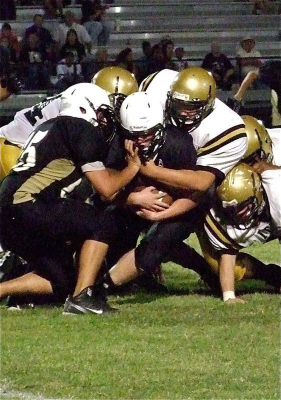 Image: Italy’s Colin Newman(71) brings down a Hubbard running back at the line-of-scrimmage.