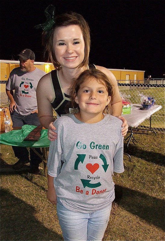 Image: Andrea Hooker is represented by her oldest daughter and Lady Gladiator cheerleader Meagan Hooker who takes a moment to show appreciation to “Team Hooker” member Taylor Souder.