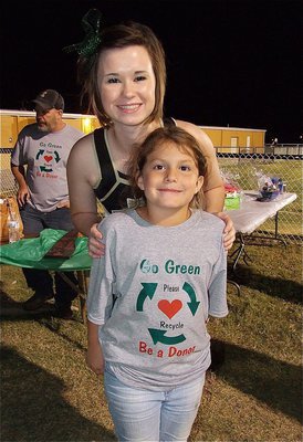 Image: Andrea Hooker is represented by her oldest daughter and Lady Gladiator cheerleader Meagan Hooker who takes a moment to show appreciation to “Team Hooker” member Taylor Souder.