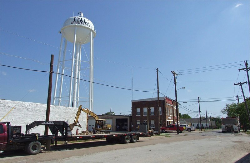 Image: A street view of the work site located next to the Italy Fire Department which faces Harpold Street.