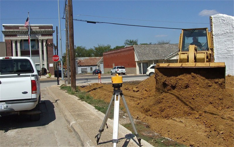 Image: The bulldozer continues to spread the sand in preparation for the new outdoor pavilion that will be utilized for several community events.