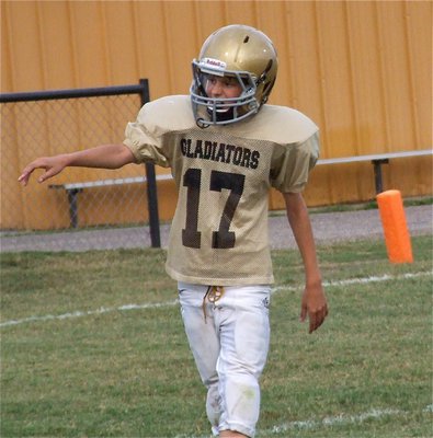 Image: Ty Hamilton(17) checks with the sideline official to get lined up.