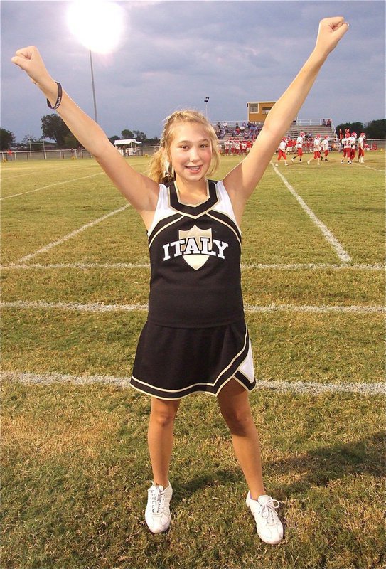 Image: IJH cheerleader Meagan Connor cheers on the 8th grade team.