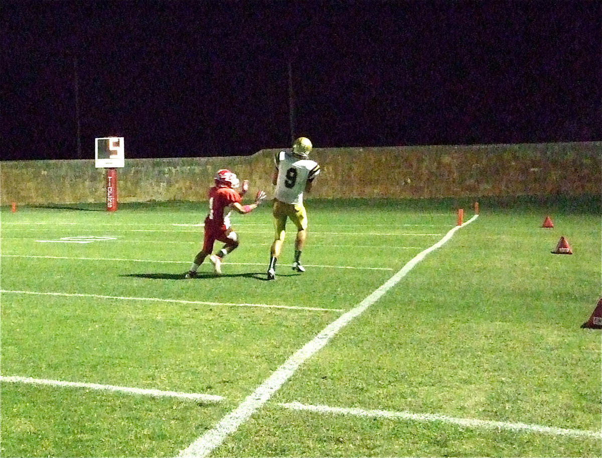 Image: Senior receiver Cole Hopkins(9) hauls in a 38-yard pass from Marvin Cox to put Italy into scoring position. Hopkins had 4 catches for 62 yards against the Tigers.